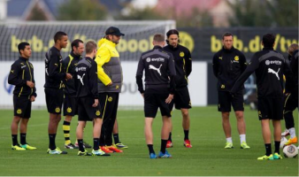Junior Flores practicing with Dortmund First Team, on far Left